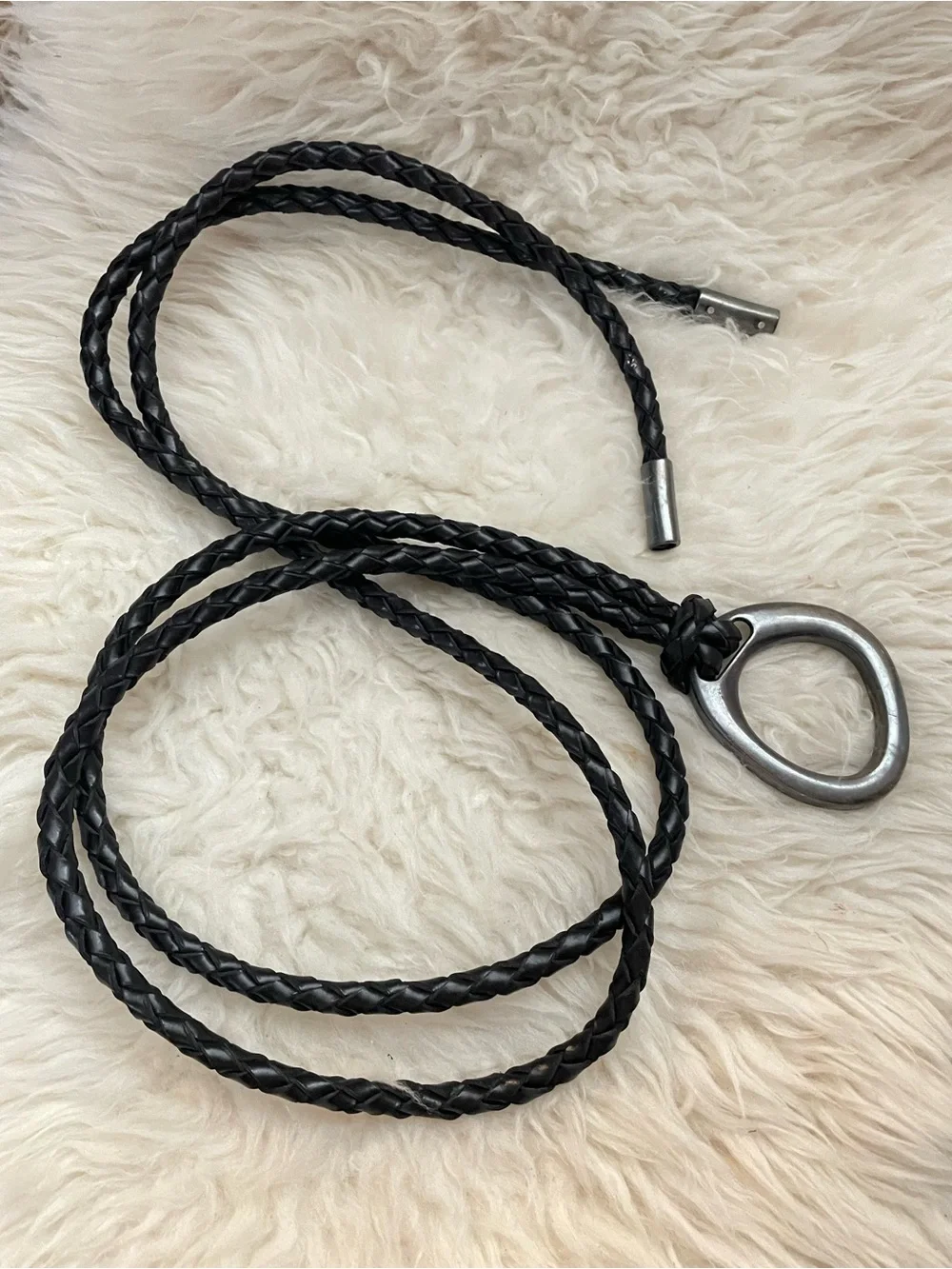 Braided black wrap around belt with a pewter ring buckle